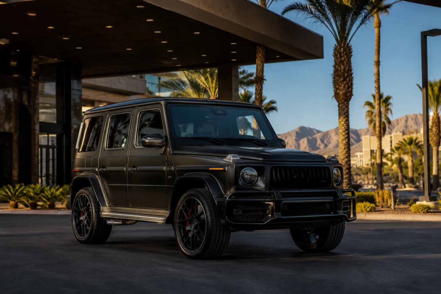 Matte black Mercedes G63 G-Wagon parked outside a Las Vegas hotel entrance